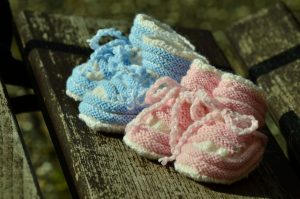 blue and pink baby shoes
